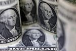 午後3時のドルは143円半ば、売買交錯が続く